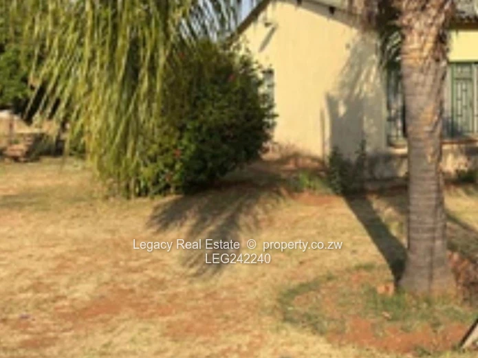 Orange Grove  Land with Incomplete House and a Cottage – Chinhoyi | 9,900m² Stand