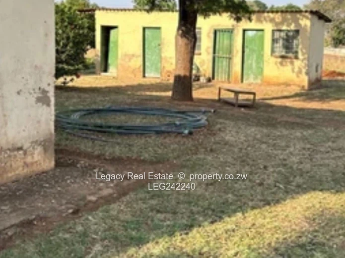 Orange Grove  Land with Incomplete House and a Cottage – Chinhoyi | 9,900m² Stand