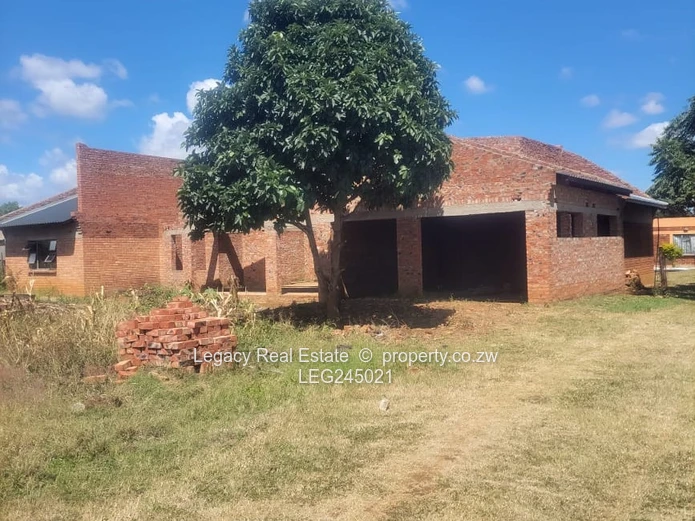 Incomplete 4 bedroomed House in Knowe on a 2000sqm land