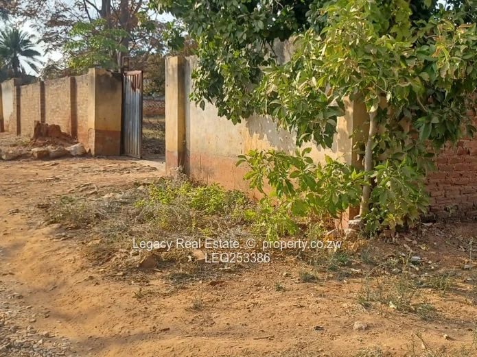 Walled 2-Bed Home on 2300m² with Verandah & Main Road Frontage (Sole Mandate)