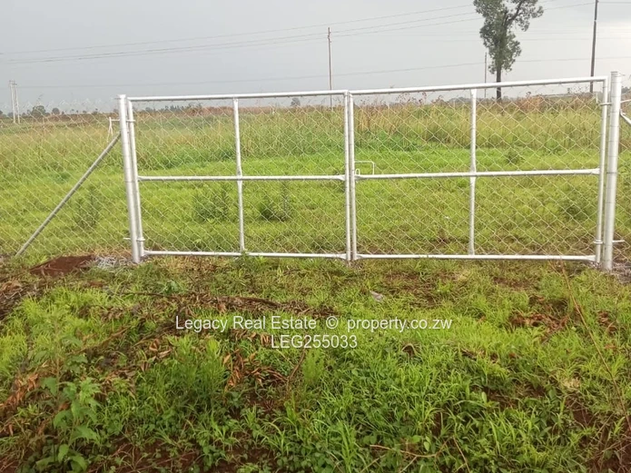 Chainlink-Fenced 1200m² Stand in Fairview — Tarred Road & Water
