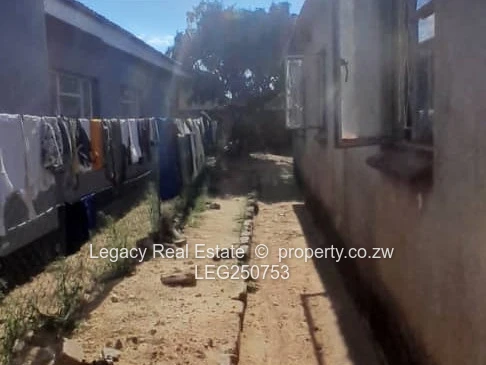 Brick 4-Bed Home with Verandah & Walled Yard