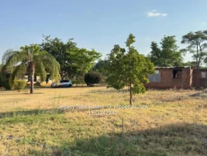 Orange Grove  Land with Incomplete House and a Cottage – Chinhoyi | 9,900m² Stand