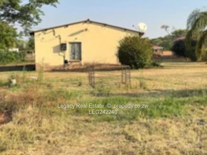 Orange Grove  Land with Incomplete House and a Cottage – Chinhoyi | 9,900m² Stand