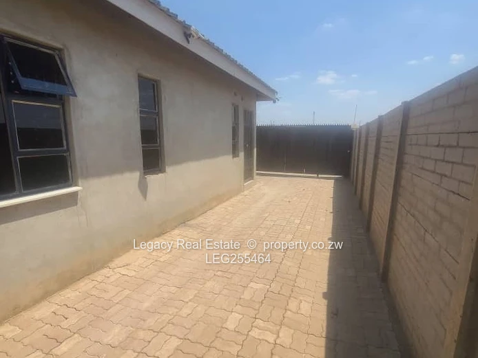 Walled 4-Bed Budiriro Home with Iron Gates & Borehole