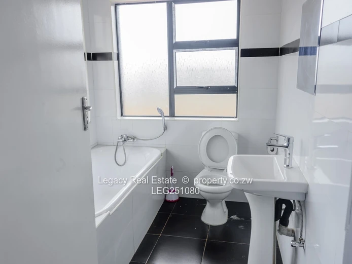Mount Pleasant Heights: 6-Bed Townhouse Complex with Brick Yard & Borehole