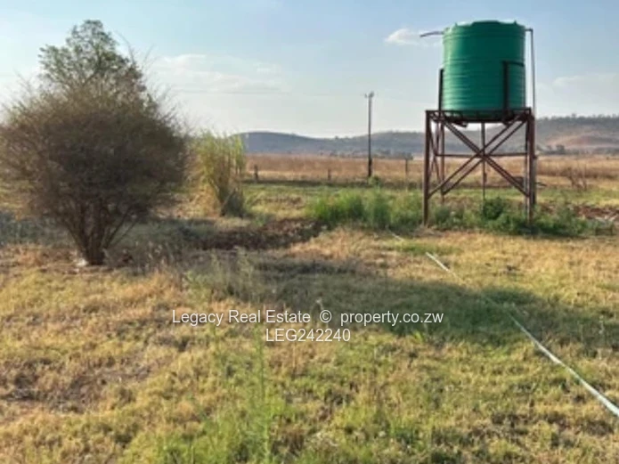 Orange Grove  Land with Incomplete House and a Cottage – Chinhoyi | 9,900m² Stand