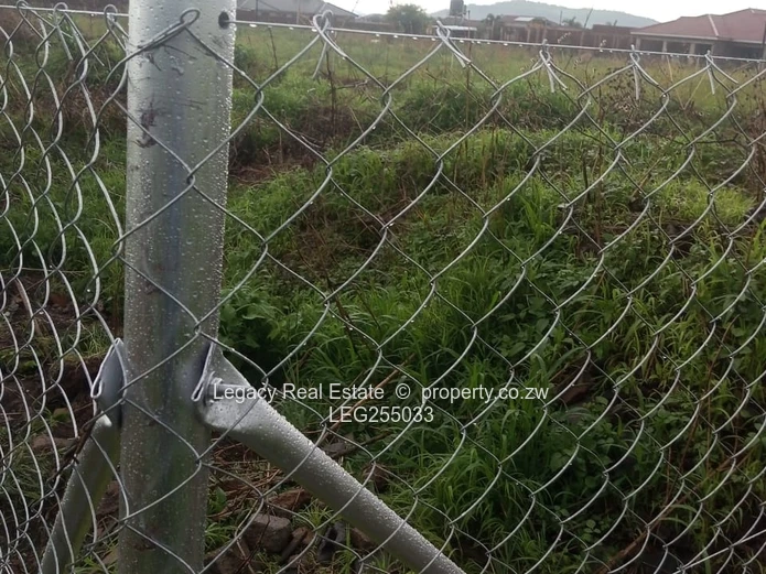 Chainlink-Fenced 1200m² Stand in Fairview — Tarred Road & Water