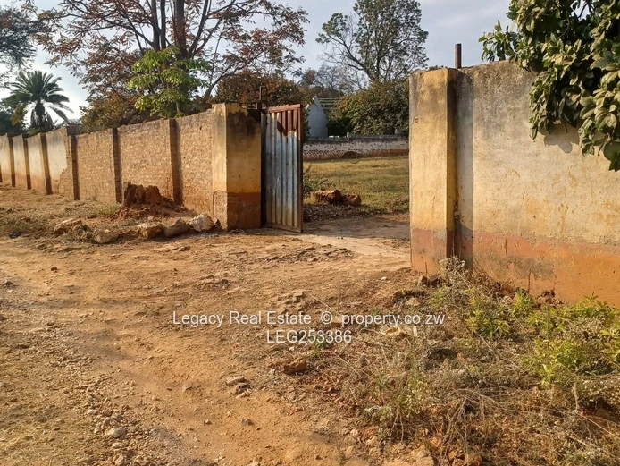 Walled 2-Bed Home on 2300m² with Verandah & Main Road Frontage (Sole Mandate)
